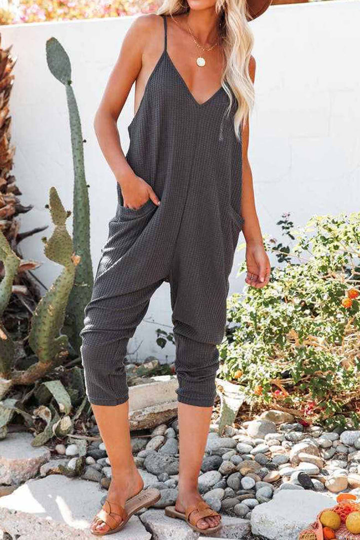 Linde – Wafelstructuur Jumpsuit met Spaghettibandjes en Diepe V-Hals