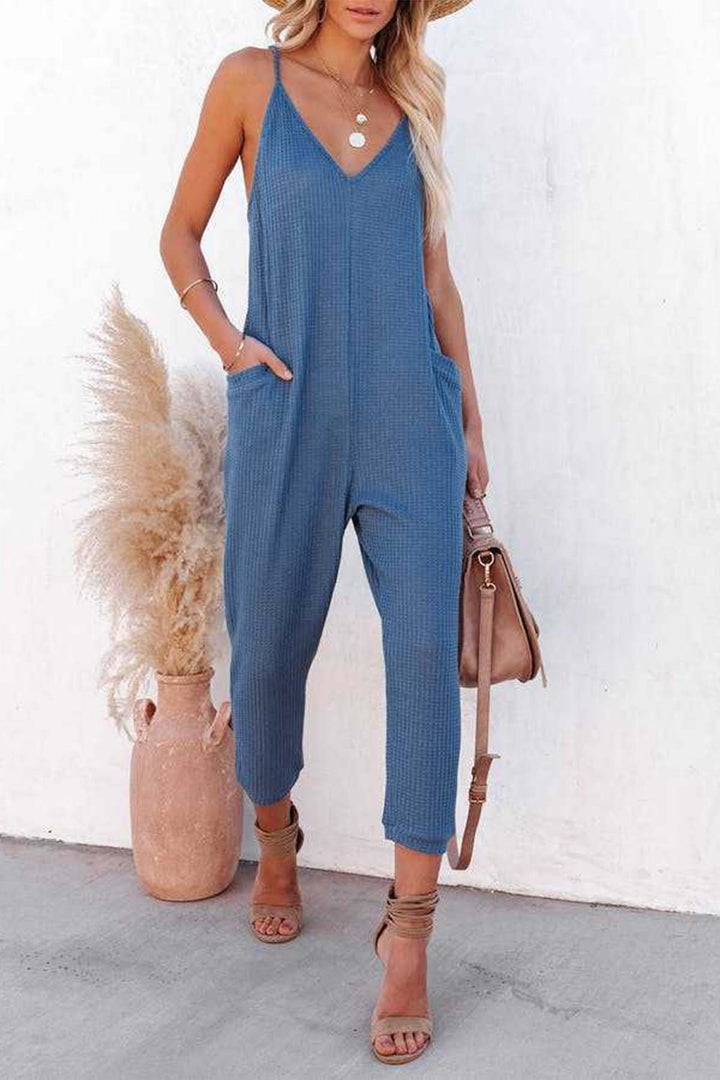 Linde – Wafelstructuur Jumpsuit met Spaghettibandjes en Diepe V-Hals
