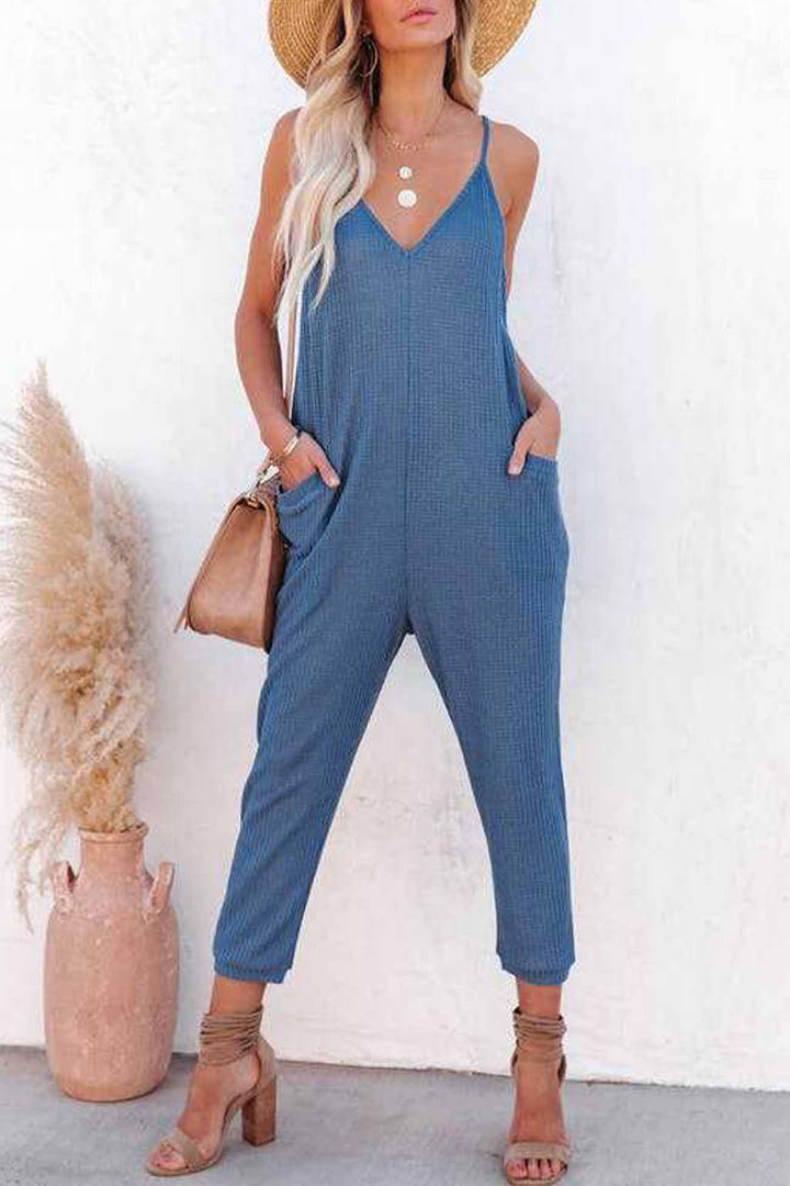 Linde – Wafelstructuur Jumpsuit met Spaghettibandjes en Diepe V-Hals