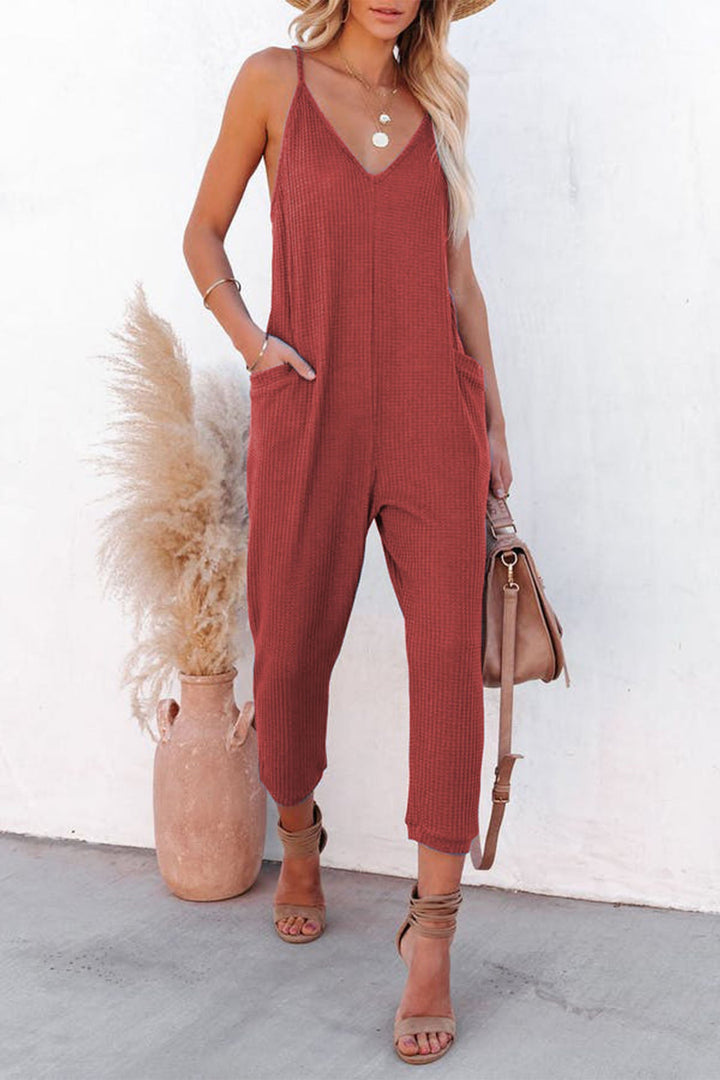 Linde – Wafelstructuur Jumpsuit met Spaghettibandjes en Diepe V-Hals
