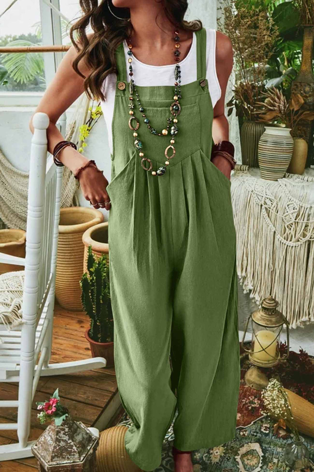 Tamar – Mouwloze Jumpsuit met Wijde Pijpen en Zakken